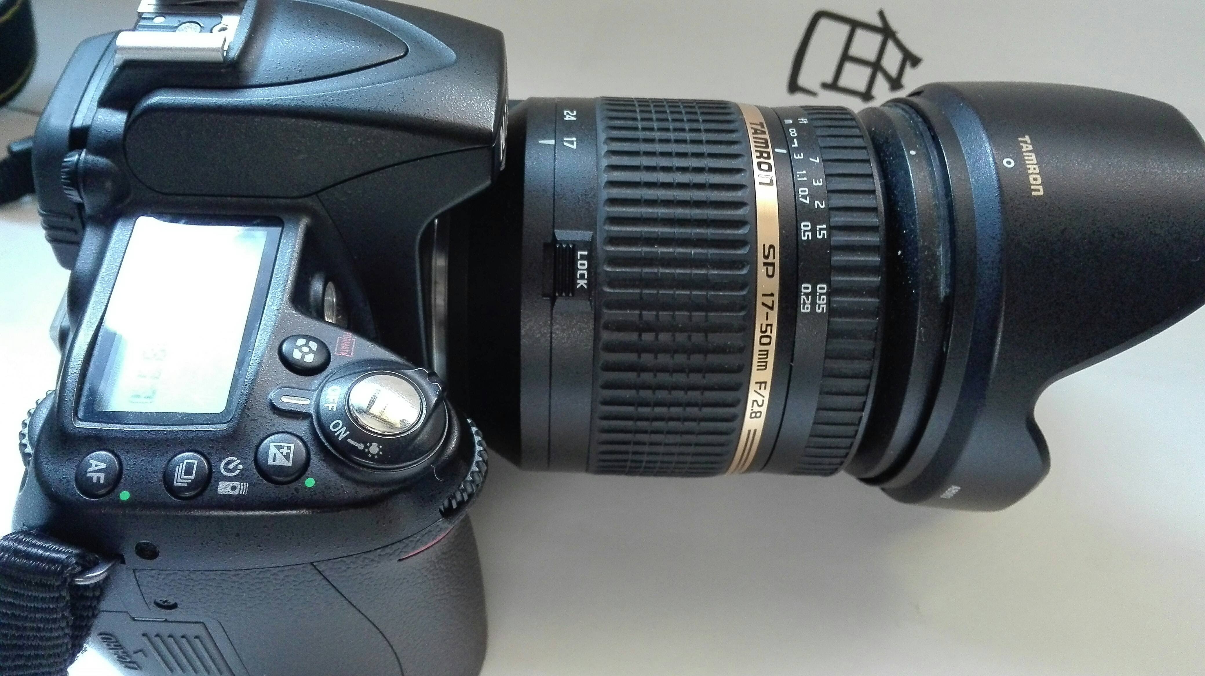 尼康相机镜头怎么安装-尼康d7100镜头怎么装