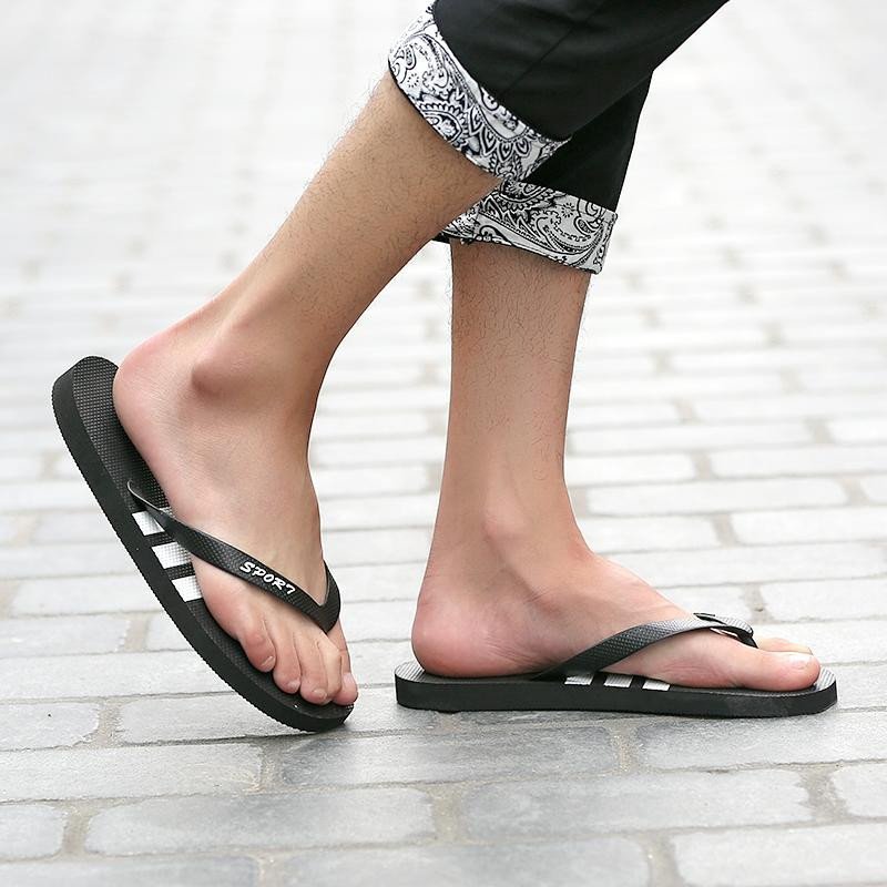 夏季人字拖男2016新品防滑运动凉鞋夹脚纯色沙滩拖鞋潮男拖鞋 纯黑色